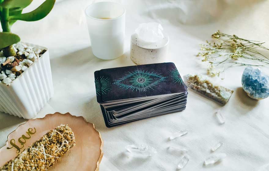 tarot with crystals and sage for the ritual
