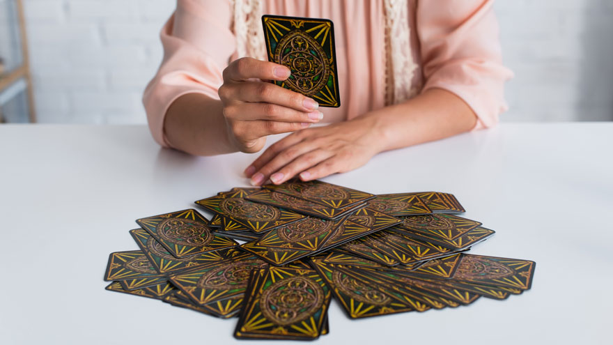 woman talking to her cards